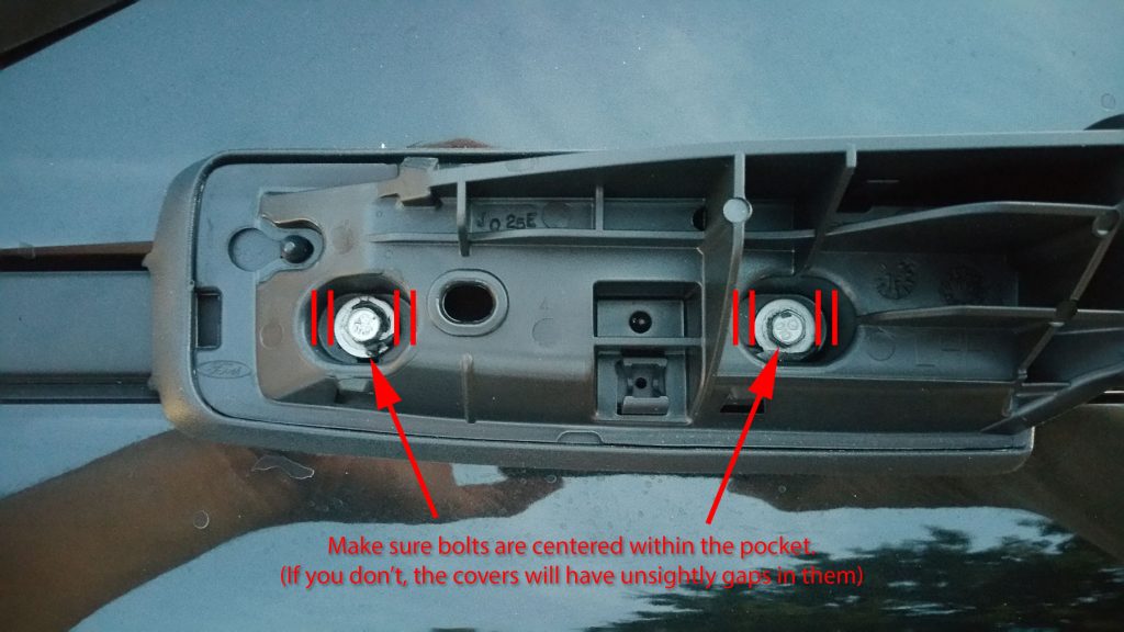 Make sure the new roof rack mounting screws are perfectly centered within the oblong holes. If you don't, the rack covers will have huge gaps in them.